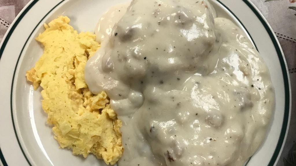Biscuits & Sausage Gravy · Two homemade biscuits smothered with Home gravy and topped with two eggs
