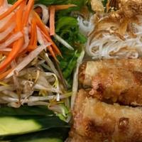 Vietnamese Pork Egg Rolls · Served with home-made fish sauce, lettuce, mint, cucumber, pickled carrot and daikon, bean s...