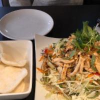 Chicken Salad · Chicken salad with shredded cabbage, celery, cucumber, bell pepper, carrots, and fresh mint....