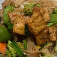 Vegetarian Chow Fun · Soft flat rice noodles are stir-fried with mixed vegetables.