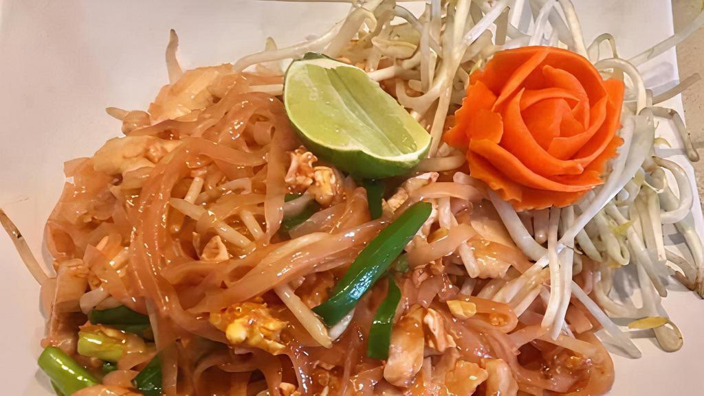Pad Thai · Medium rice noodles with egg and bean sprouts with vegetables topped with ground peanuts.