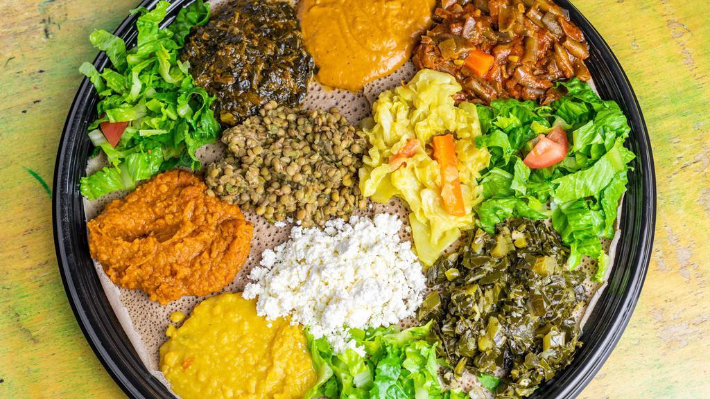 Vegan Signature Plate · A sampling of all our Vegan dishes served with salad and Injera.