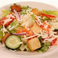 House Salad · Lettuce, tomato, red onions, carrots, cucumbers, mozzarella and croutons.