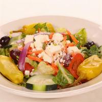 Greek Salad · Lettuce, tomatoes, carrots, cucumbers, feta cheese, kalamata olives, pepperoncini, onions an...