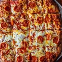 Sicilian Pizza · A thicker square crust 16x16 square.