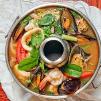 Tom Yum Seafood · Spicy. Hot and sour seafood soup. Thai's spicy and sour soup with roasted chili paste, lemon...