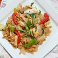 Drunken Noodles · Spicy. Pan-fried flat rice noodles, bell peppers, onions, carrots, basil leaves and chili ga...