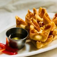 Crab Ragoons (8) · Deep fried wontons stuffed with cream cheese, vegetables, crabmeat served with plum sauce.