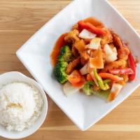 Sweet & Sour · Tempura-battered meat with tomato-based sauce, bell peppers, onions, carrots, and pineapple.