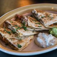 Matador Quesadilla · Monterey jack, guacamole, pico de gallo and cilantro-limé sour cream cheese. (Cheese - No Pi...