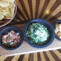 Matador Guacamole · Pico de gallo, house-made chicharrones, queso fresco, cilantro