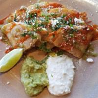 Quesadilla Sayulita · Griddled Monterey Jack cheese, chipotle shrimp, hot sauce, pico de gallo, guacamole, cilantr...