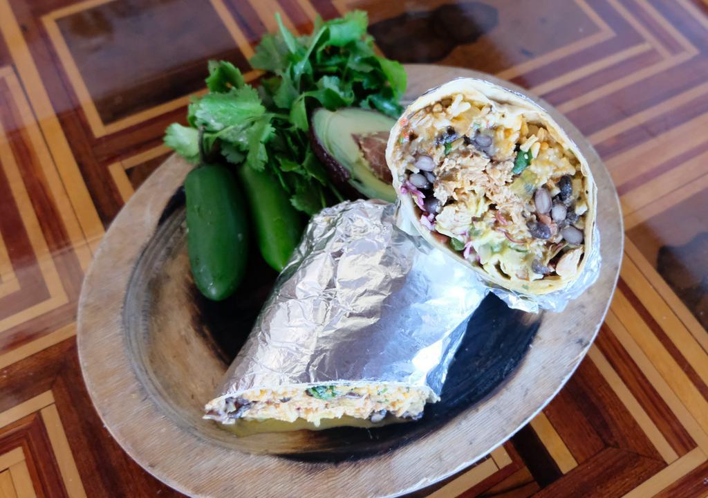 Burritos Ultimos · Nine layer burritos with achiote-chile rice, Mexican black beans, guacamole, garlic crema, pico de gallo, serrano slaw, jack and cheddar cheeses, choice of sauce and protein, all wrapped in a thirteen inch tortilla. 
Consuming raw or undercooked food items may increase your chance of food-borne illness.