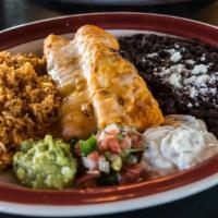 Enchiladas · Monterey Jack, pico de gallo, guacamole, cilantro-lime sour cream, achiote-chile rice, Mexic...