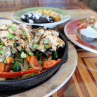Fajita-Style For Four (Pick Two) · Four large tortillas per person (choice of corn or flour), lettuce, jack and cheddar cheeses...