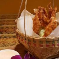 Coconut Prawns · Deep fried prawn batter in coconut, salad served with BT dressing.