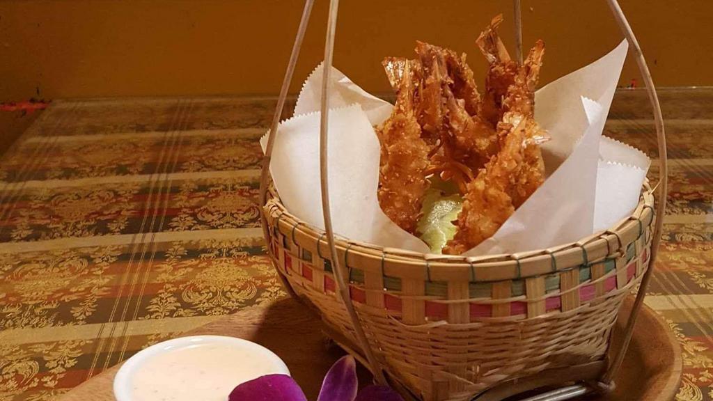 Coconut Prawns · Deep fried prawn batter in coconut, salad served with BT dressing.