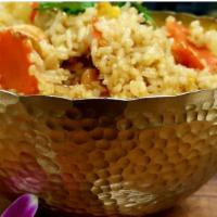 Pineapple Fried Rice · Choice of meat, jasmine rice, egg, pineapple, onions, carrot, cashew nut, curry powder, and ...