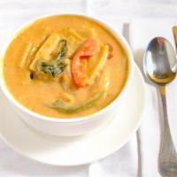 Red Curry · Choice of meat, red curry, coconut milk, bamboo shoots, bell pepper, and lime leaves (come w...