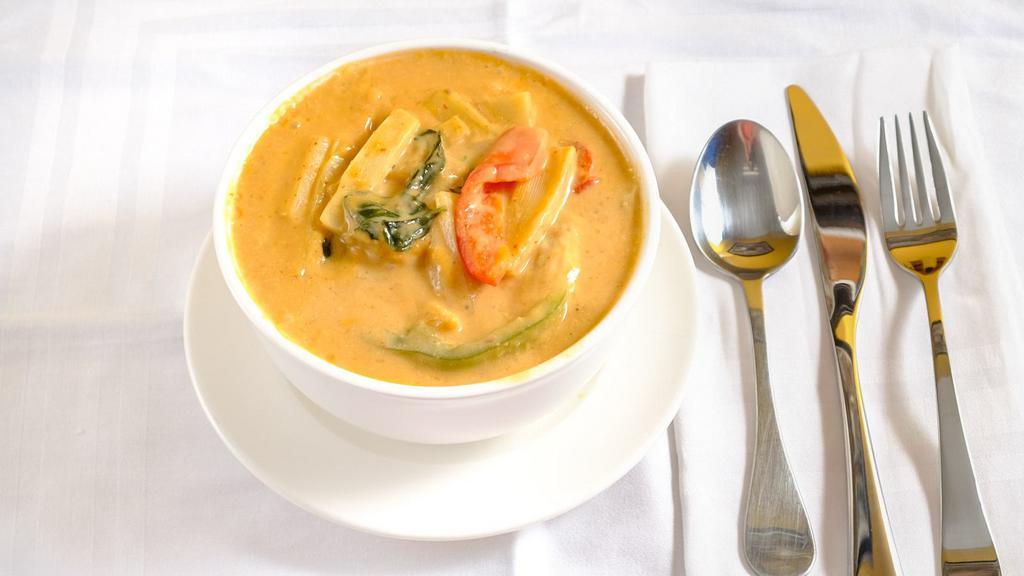 Red Curry · Choice of meat, red curry, coconut milk, bamboo shoots, bell pepper, and lime leaves (come with rice)