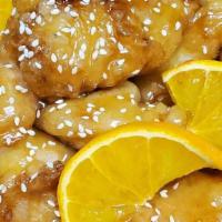 Orange Chicken  · Crispy chicken with orange sauce and sesame seeds on top.(served with rice)