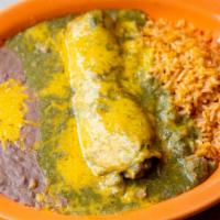 Enchiladas Verdes · Two corn tortillas filled with chunks of pork and topped with tomatillo green sauce and melt...
