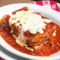 Lasagna Alla Napoletana · Beef, ricotta, tomato sauce & smoked mozzarella