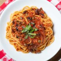 Spaghetti Alla Puttanesca · Olive oil, garlic, crushed tomatoes, capers, olives, red pepper & a touch of anchovy