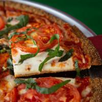Aunt Margherita Pizza · If the Queen of Savoy would eat this pizza then it's good enough for your aunt. Our signatur...