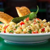 Alfredo The Dark · Poblano peppers and a blend of southwest cheeses are sauteed with spiral pasta and topped wi...