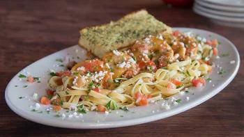 El Diablo Pasta · You won’t need a fire hose but this dish definitely has a kick! We toss chicken or BIG tail-...