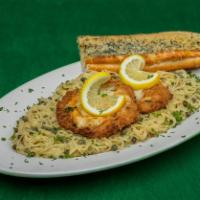 Hakuna Piccatta · Two large chicken breasts lightly breaded and baked to perfection, served over fettuccini pa...