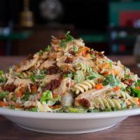 Vino Bambino · Fresh Romaine blend with Caesar dressing and a medley of tri-colored pasta, black olives, be...