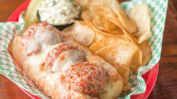 Meatball Sandwich · Weighing in at over a ½ lb., three huge homemade meatballs are nestled in an Italian roll an...