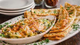 Boom Dip · A delicious concoction of spinach, artichokes and cheese served with our Italian chips for d...