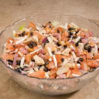 Chopped Salad · A flavorful combination of chicken, salami, olives, red onions, our 3-cheese blend, and toma...