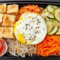 Tofu Bibimbap · Mixed vegetables(carrot, zucchini, bean sprout, radish) and fried tofu layered on white rice...