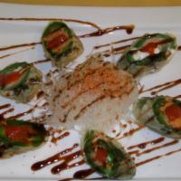 Heart Attack (6) · Spicy. Stuffed jalapeno with spicy tuna and cream cheese, fried and topped with unagi sauce....