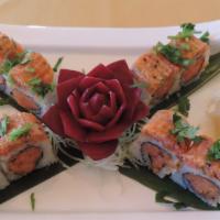 Prince Charming · Spicy tuna and spicy salmon on the inside topped with spicy yellowtail and cilantro. Raw.