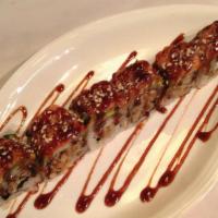Ninja Roll · Fried soft shell crab topped with avocado, spicy tuna and glazed with house special sauce. R...
