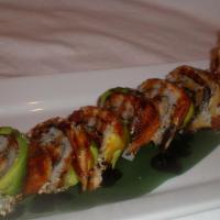 Black Dragon Roll · Shrimp tempura on the inside covered with unagi, avocado and eel sauce.