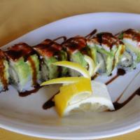Friend Roll · Shrimp tempura inside covered with avocado, snow crab and eel sauce.