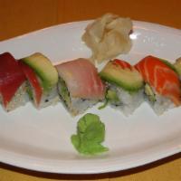 Rainbow Roll · Crabmeat, cucumber and avocado wrapped with varieties of raw fish, tuna, salmon, red snapper...