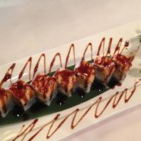 King Roll · Shrimp tempura and mango on the inside topped with Japanese lobster salad and glazed with ho...