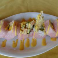 Mango Roll · Shrimp tempura, fresh mango, Japanese lobster salad,cucumber wrapped with soy paper and glaz...