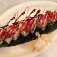 Dancing Roll · Shrimp tempura wrapped with spicy crabmeat and Japanese surf clam, blended with house specia...