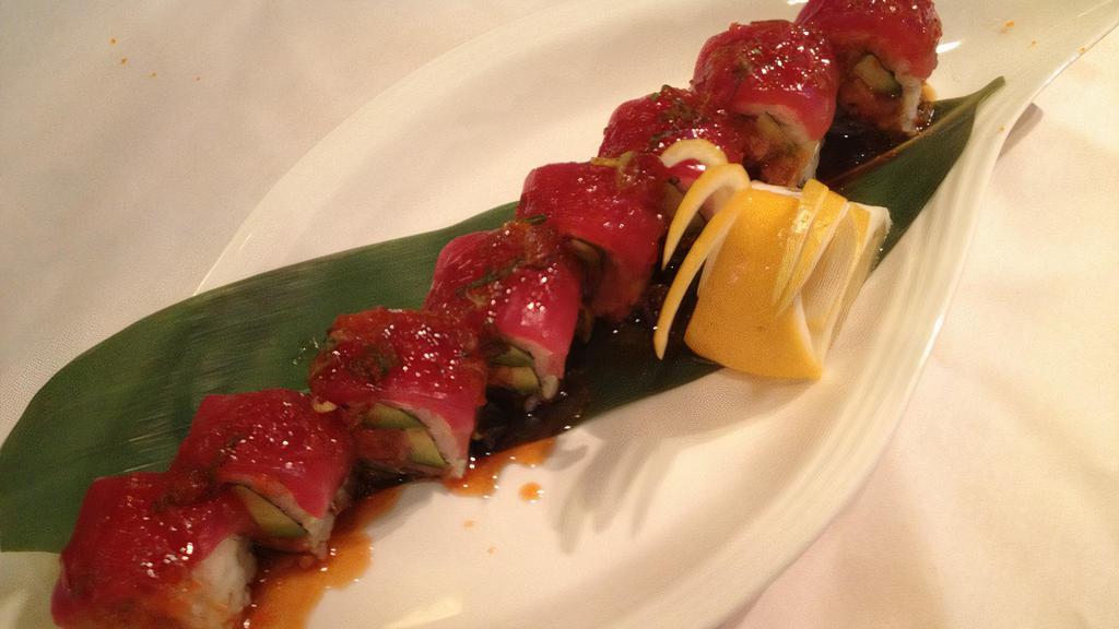 Fire Star Roll · Spicy tuna, avocado, tuna on top with our spicy garlic sauce. Raw.