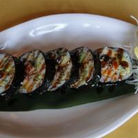 Ocean Roll · Spicy crabmeat, tamago, eel, shrimp, cucumber and avocado with special sauce.