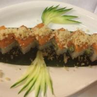 Snow Crab Roll · Snow crab with avocado wrapped with spicy tuna sprinkled with tempura flakes. Raw.