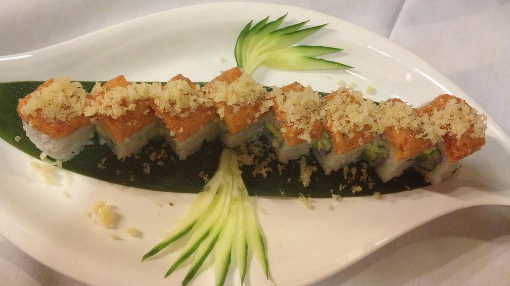 Snow Crab Roll · Snow crab with avocado wrapped with spicy tuna sprinkled with tempura flakes. Raw.